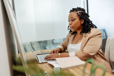 Sandbox team member working at computer