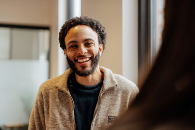 Sandbox team member smiling at the camera